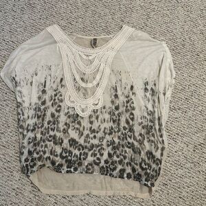 Free People blouse with leopard print and crochet detail size medium